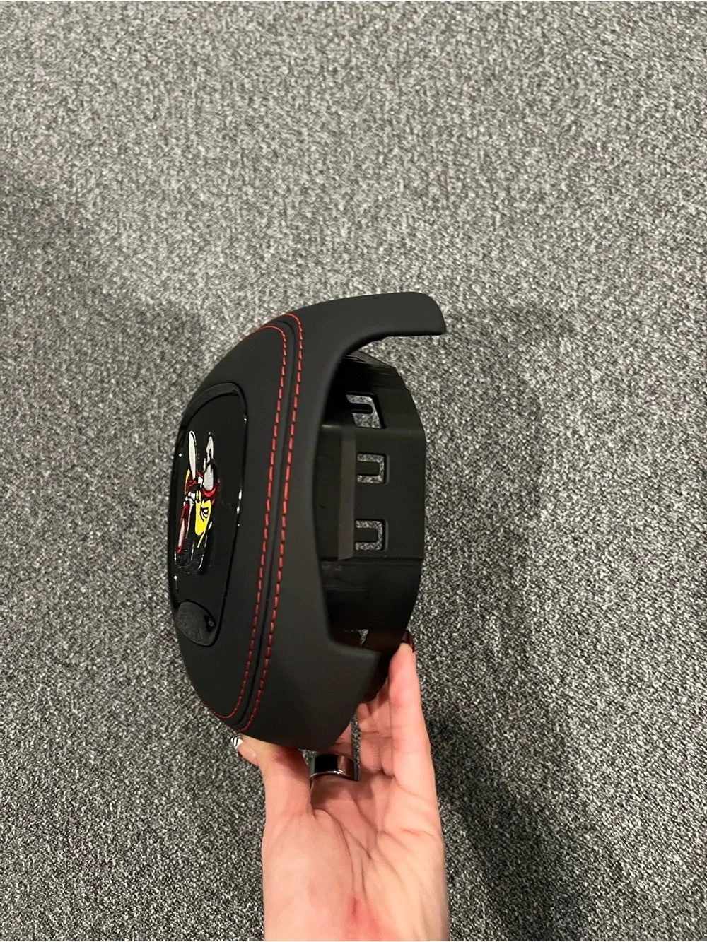 Black Airbag Cover with Red Stitching and Bee Patch
